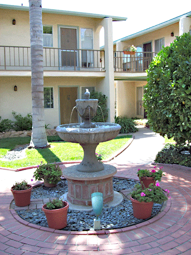 Palm Tree apartments water fountain picture